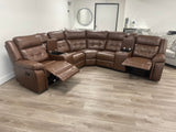 Soft saddle brown leather reclining sectional with cup holders